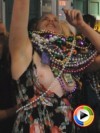 Drunk party girl doesnt notice her tits are still out as she tries to get more beads