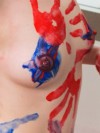 Ravon covers her tight teen body with finger paint and then rinses off