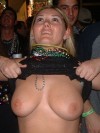 Girls showing off their big tits in public