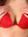 Watch as Ruby pushes her perky perfect tits together in a sexy red bra